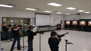 Competitors shooting air rifles at the 2021 Iowa State 3 Position Air Rifle Championship