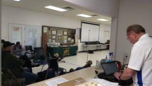 Officials and spectators at the 2021 Iowa State Air Rifle Championship